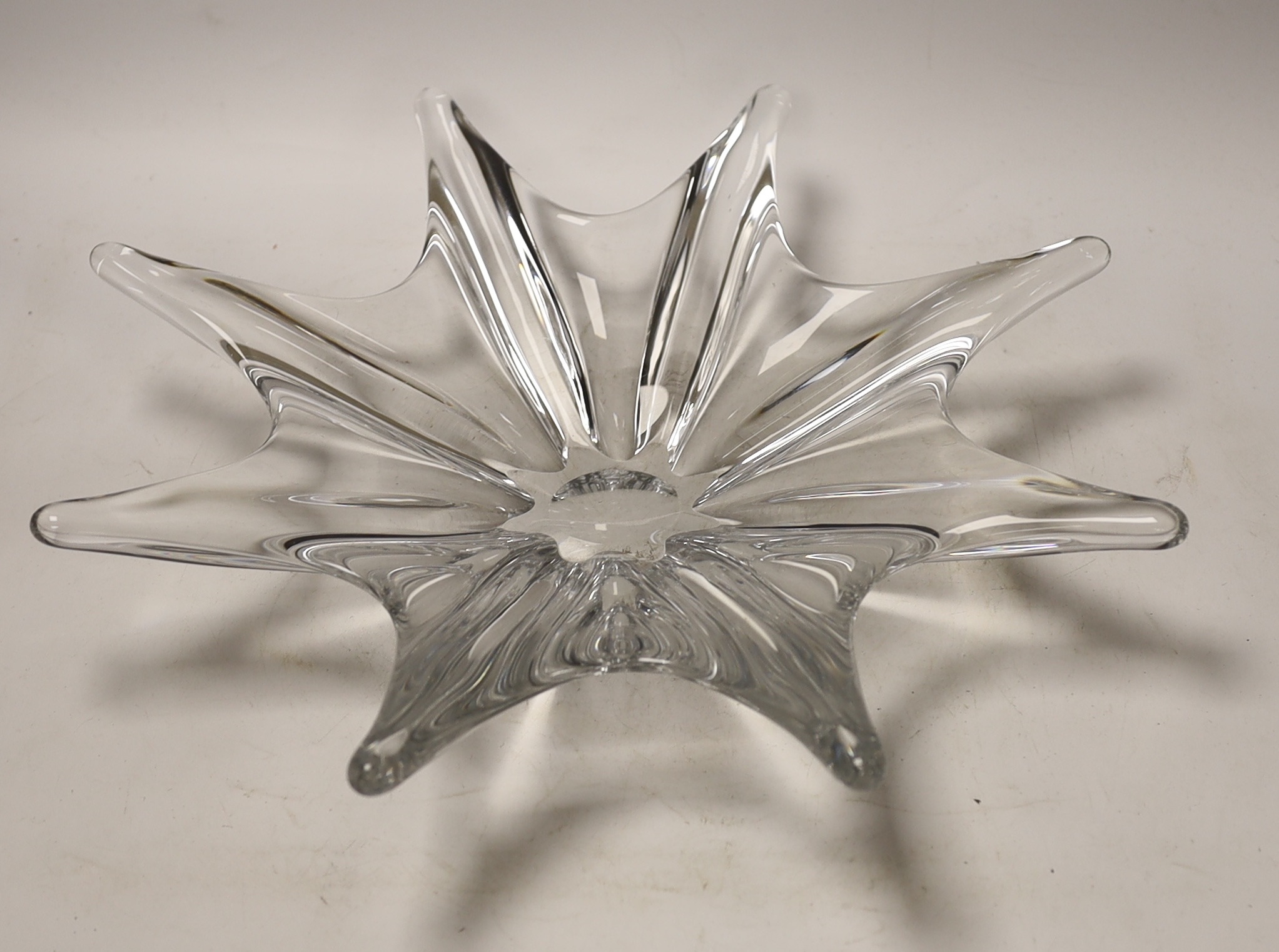 A Baccarat stamped glass star-shaped dish, 38cm diameter